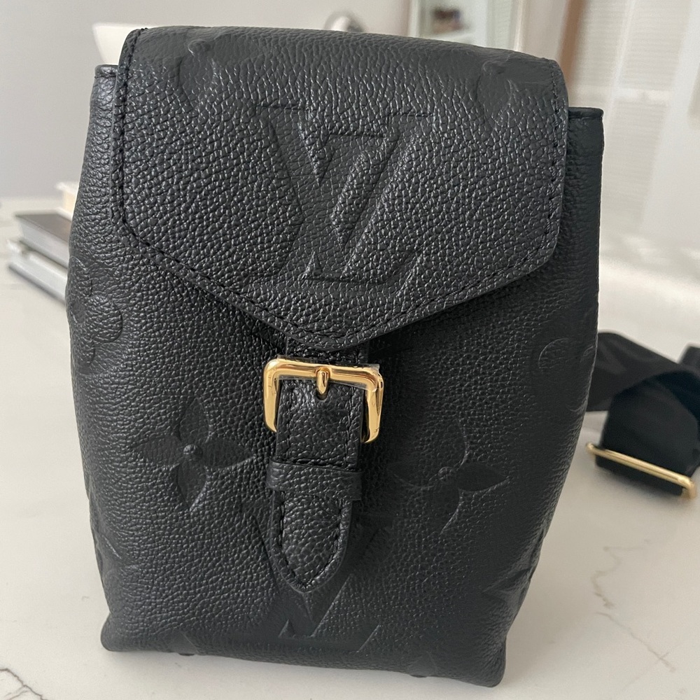 SOLD via 🅿️🅿️Louis Vuitton Tiny Backpack Black Empreinte